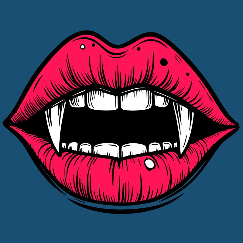 lips with vampire teeth
