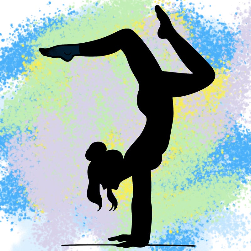 a woman doing a handstand