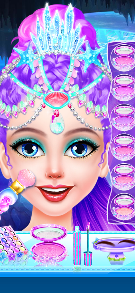 Mermaid Simulator! - Mermaid character with purple hair and a crystal crown getting blush applied in a beauty salon game.