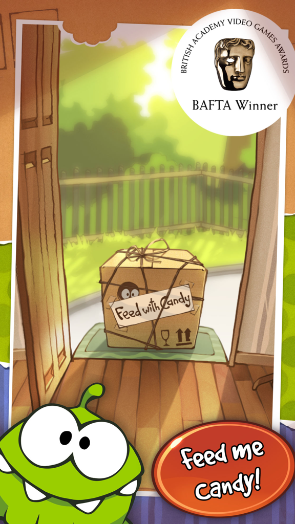 Cut the Rope GOLD - Om Nom the green monster next to a mysterious package with a BAFTA Winner badge