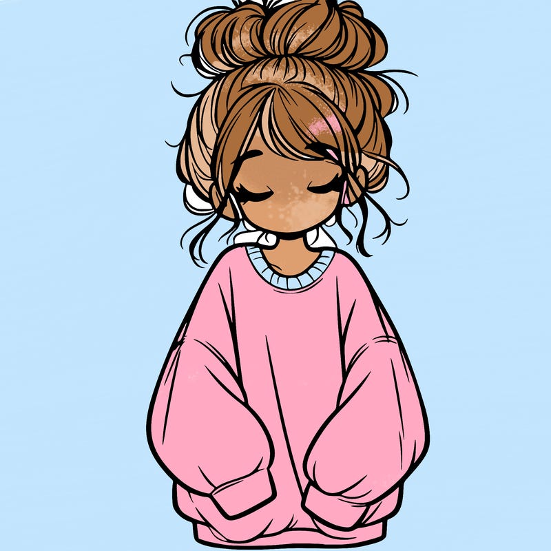 girl with baggy sweatshirt and messy bun