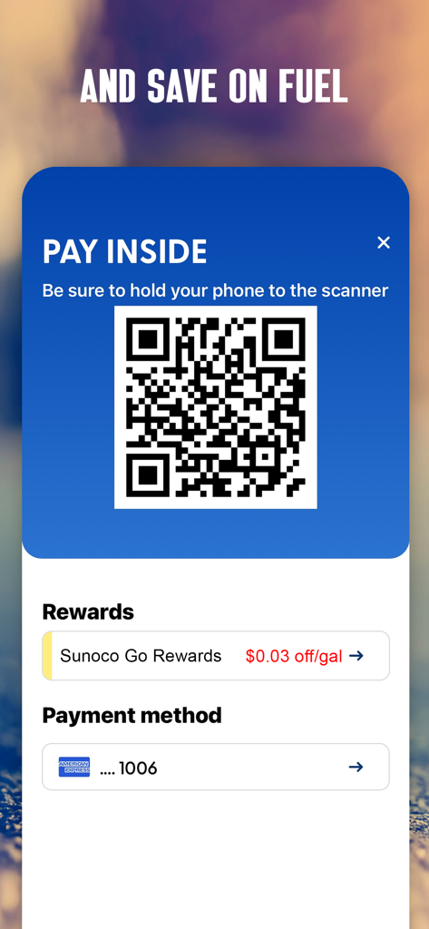 Sunoco GO REWARDS app screen showing a QR code for in-store payment with fuel savings rewards and credit card details.
