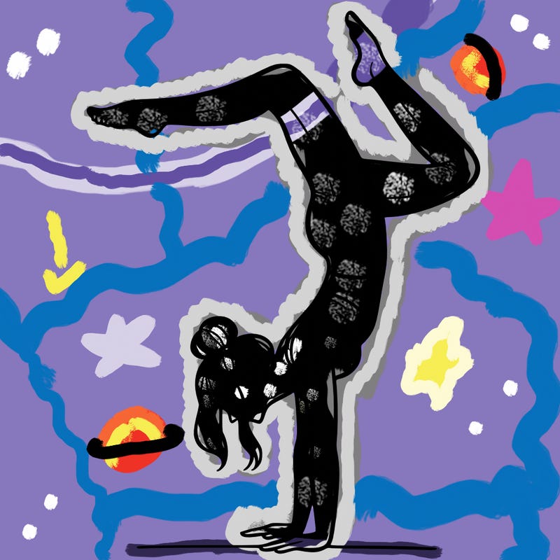 a woman doing a handstand