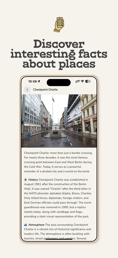 Walky: Walking Tours & Routes - Pantalla de la aplicación Walky que muestra datos e historia interesantes sobre el Checkpoint Charlie en Berlín