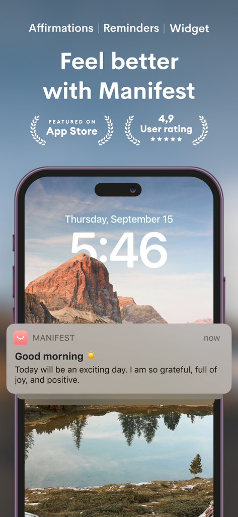 Manifest - Daily Affirmations - Una pantalla de bloqueo de smartphone que muestra una notificación de afirmación diaria positiva de la aplicación Manifest sobre un fondo escénico de montaña.