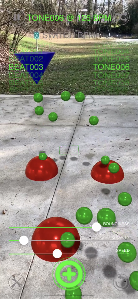 Sound Drop AR - Augmented reality interface showing green balls bouncing on red reactors in an outdoor setting to create music beats.