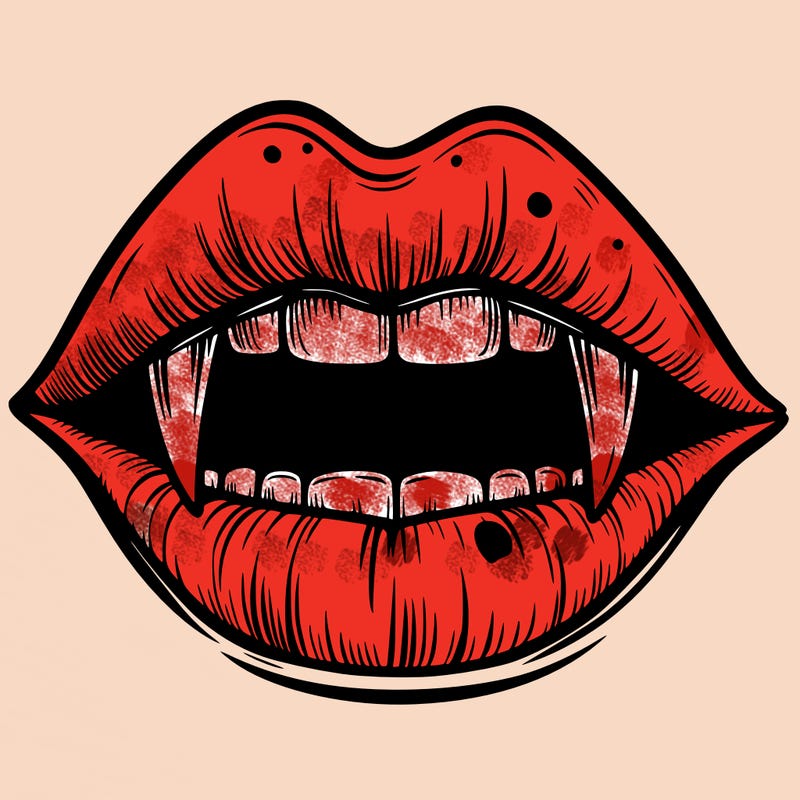 lips with vampire teeth