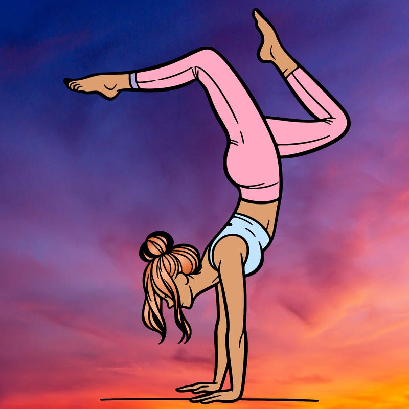 a woman doing a handstand