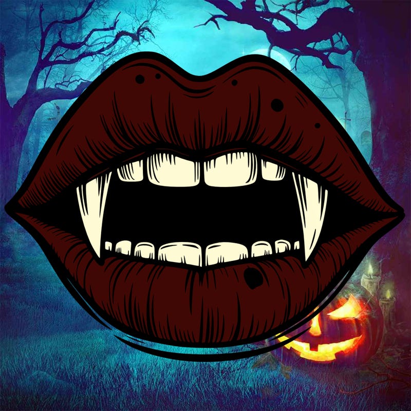lips with vampire teeth