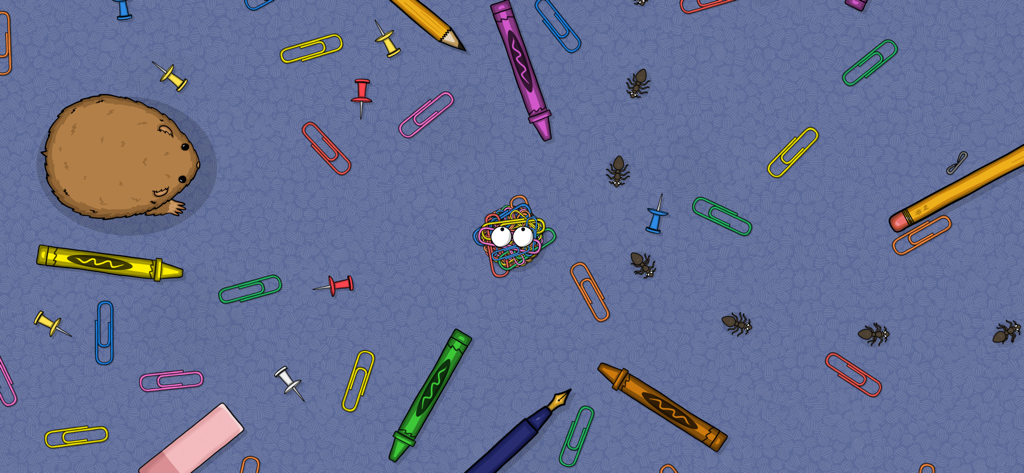 The colorful Paperclip Maximizer character in a level filled with office supplies and a hamster in Tasty Planet Final Bite
