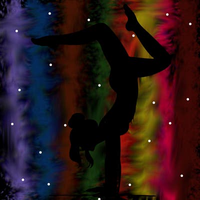 a woman doing a handstand