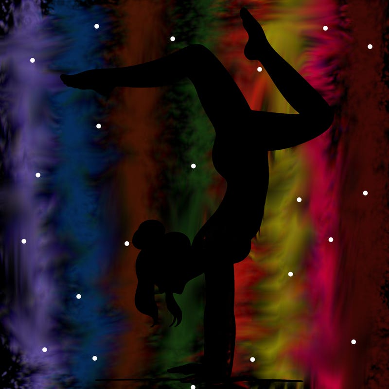 a woman doing a handstand