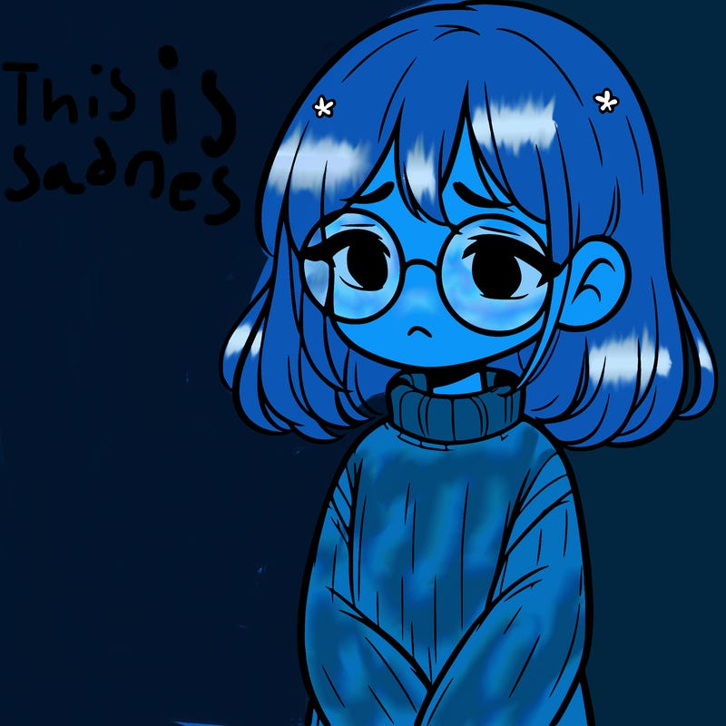 sad girl with glasses in a sweater