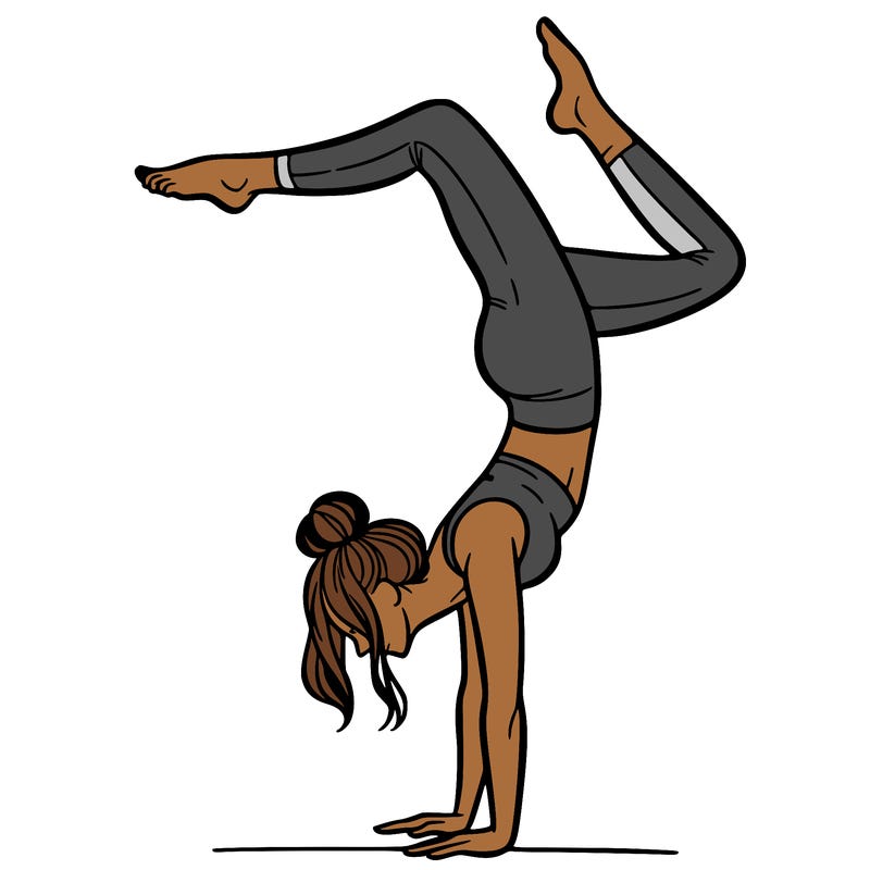 a woman doing a handstand