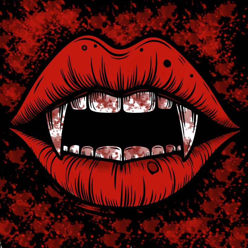 lips with vampire teeth