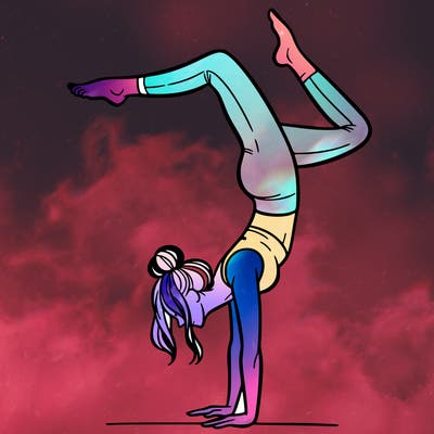 a woman doing a handstand