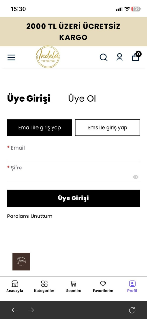 Indela Toptan Takı - User login screen for the Indela Toptan Taki wholesale jewelry mobile application showing email and SMS login options.