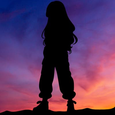 girl in baggy pants crop top and long hair