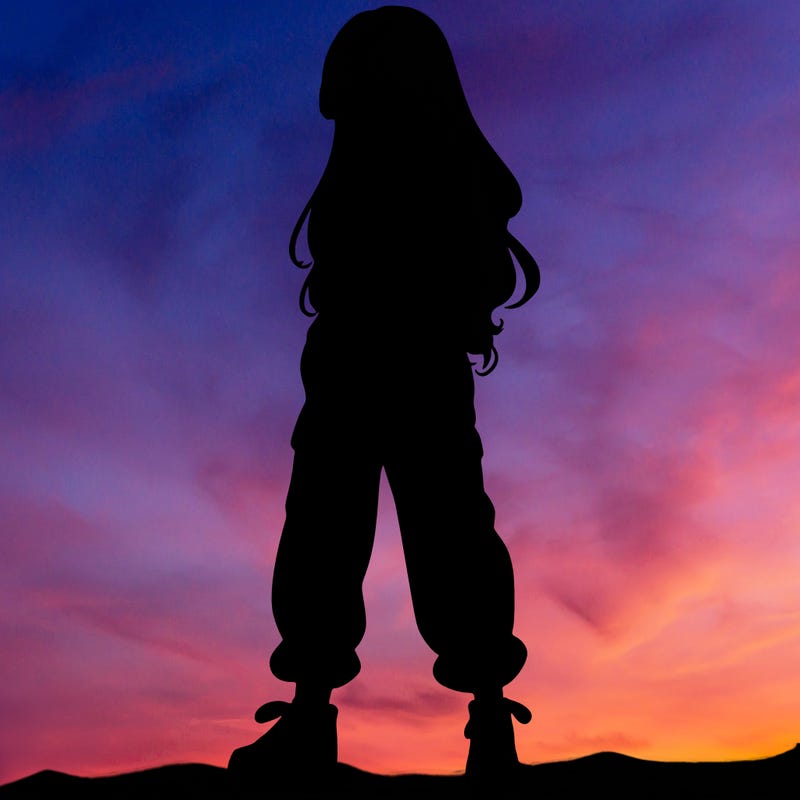 girl in baggy pants crop top and long hair