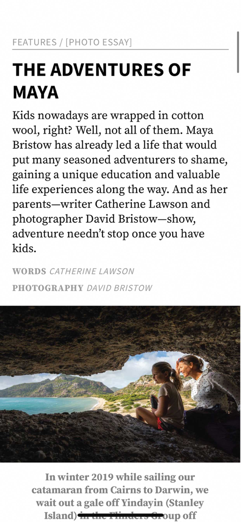 Wild app article titled The Adventures of Maya showing a photo of a mother and daughter in a coastal cave.