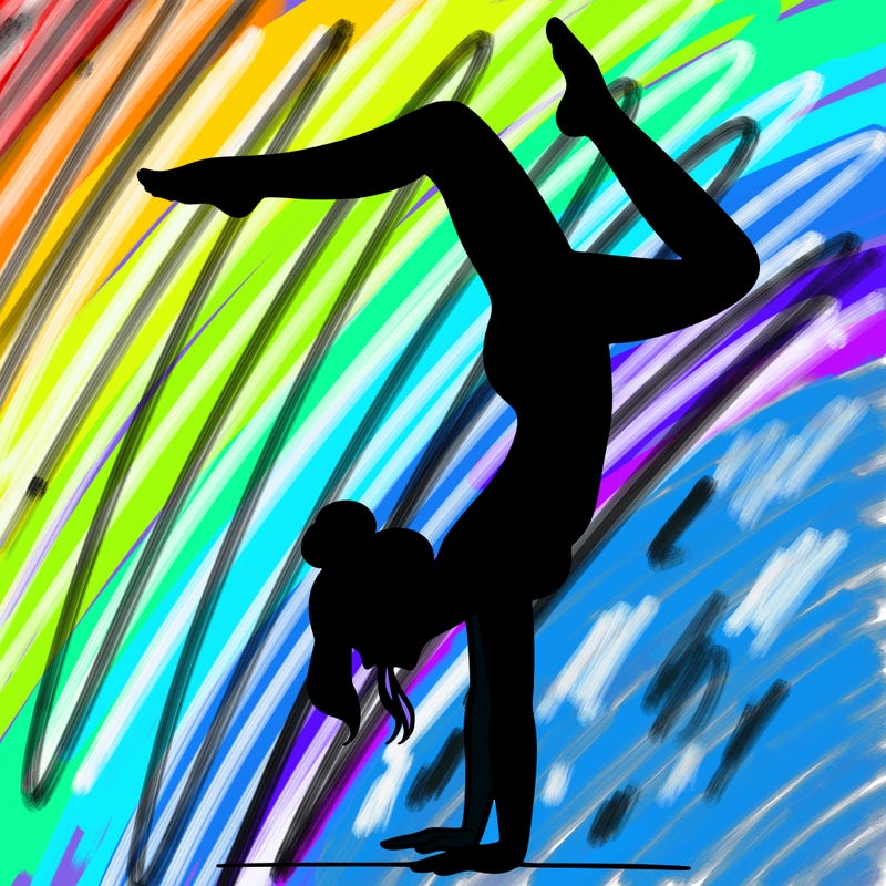 a woman doing a handstand