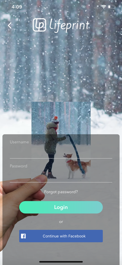 Lifeprint Printers - Lifeprint login screen featuring a hand holding a printed photo over a snowy forest background