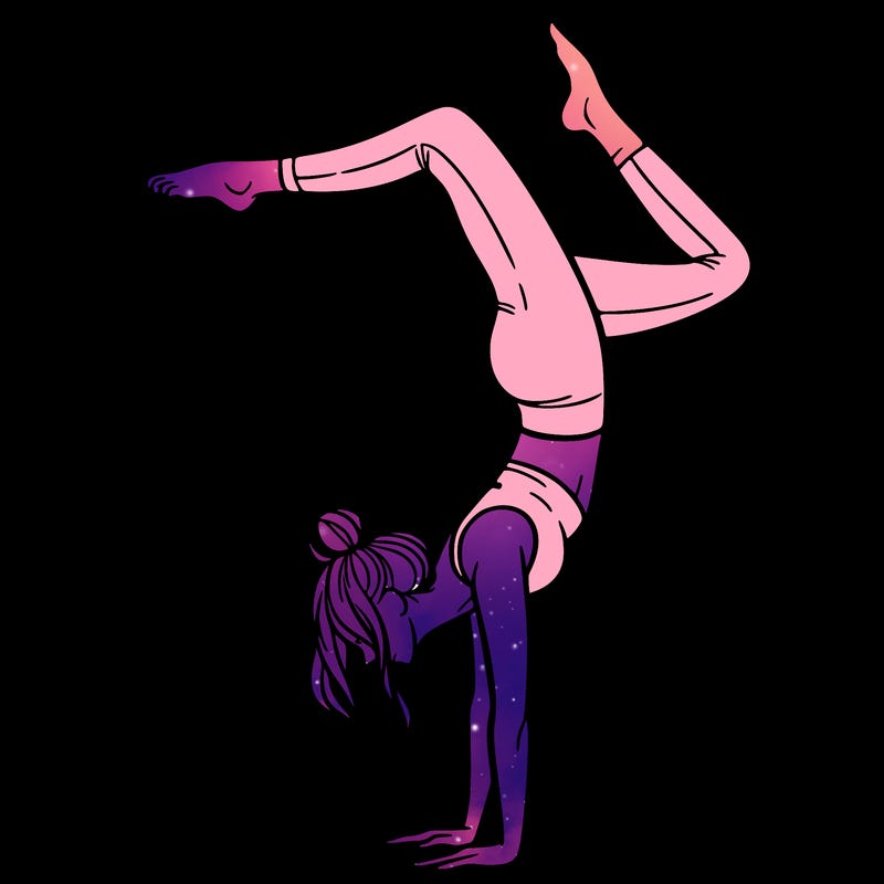 a woman doing a handstand