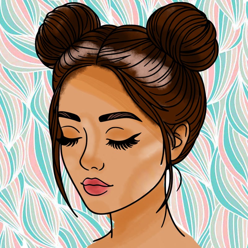woman with hair buns