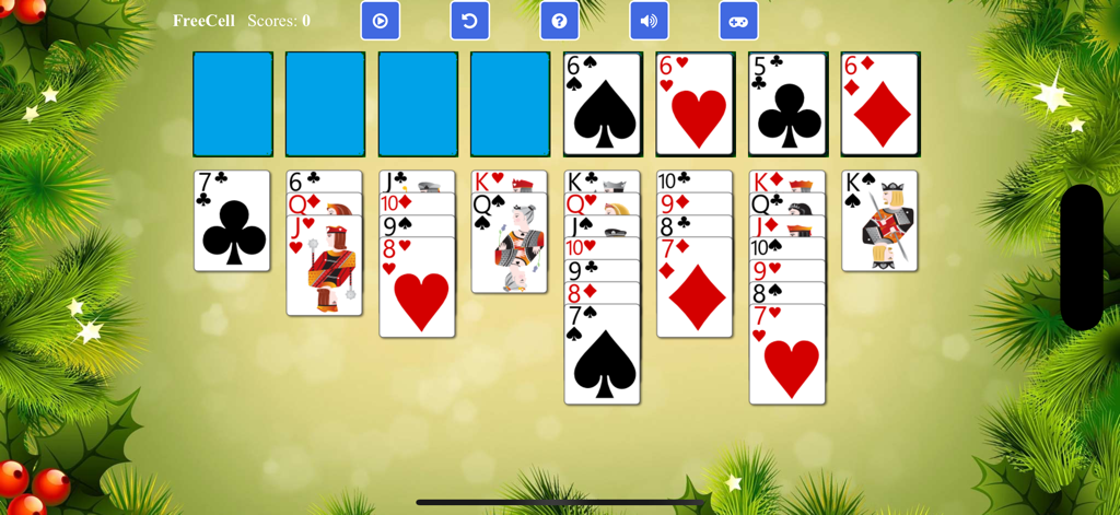 FreeCell Solitaire - - FreeCell Solitaire game screen with a festive Christmas theme background featuring evergreen branches