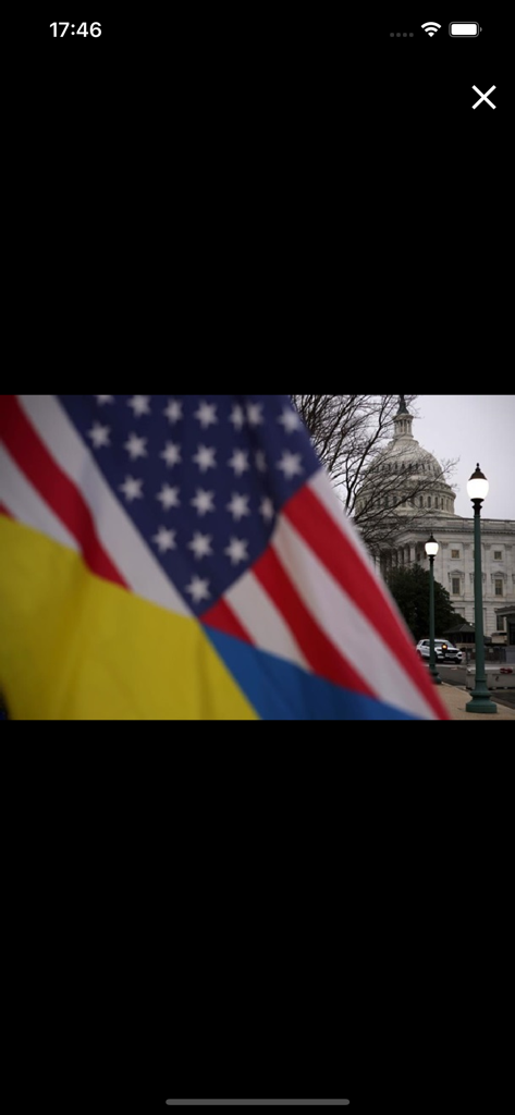 Корреспондент - новости - US Capitol building viewed behind American and Ukrainian flags