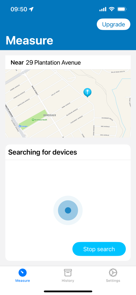 iSober - iSober app measure screen showing GPS location and searching for a breathalyzer device.