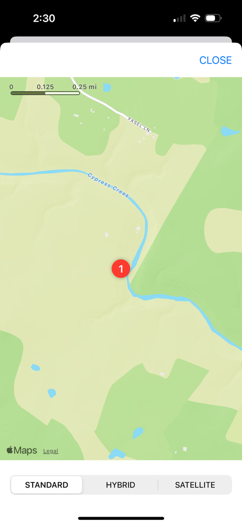 Map interface in Map Tools showing a red pin marker on a green landscape with a river