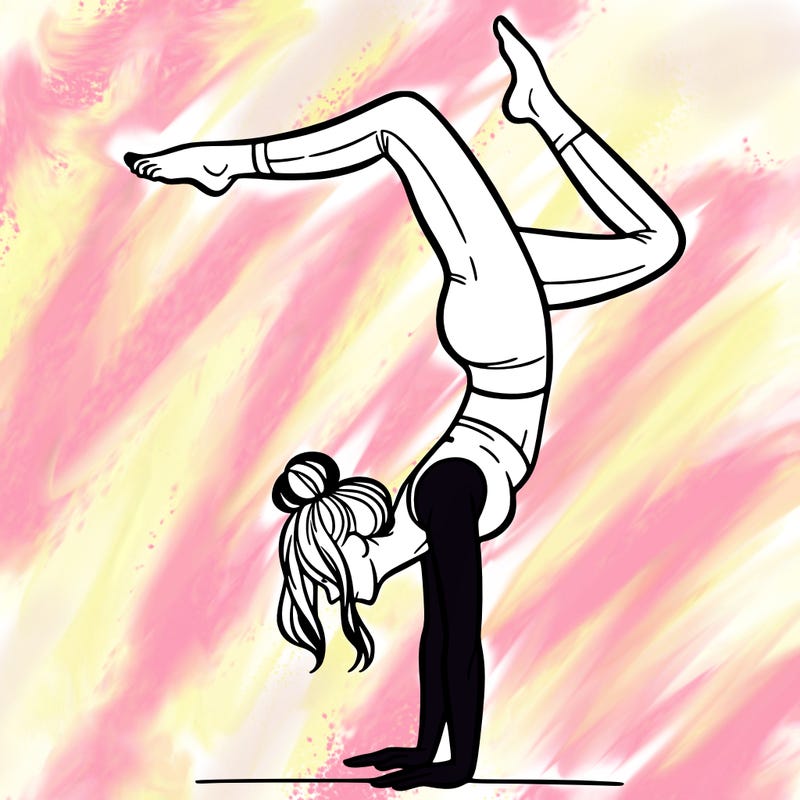 a woman doing a handstand