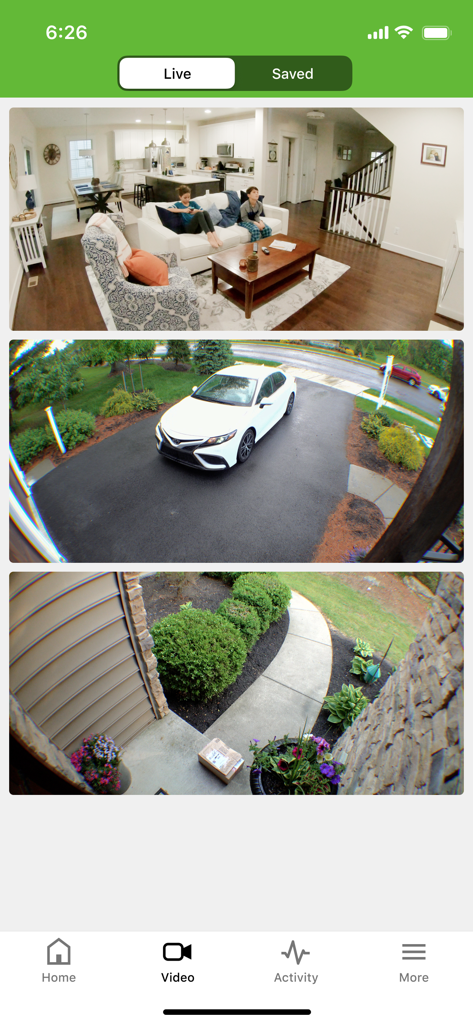 HomePro Security - Interface of HomePro Security app displaying live camera feeds of a living room driveway and front porch