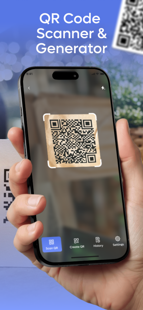 Hand holding an iPhone scanning a QR code using the Barcode Scanner and Reader app interface