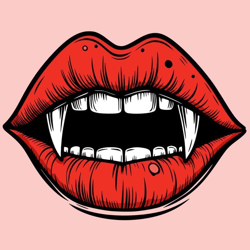 lips with vampire teeth