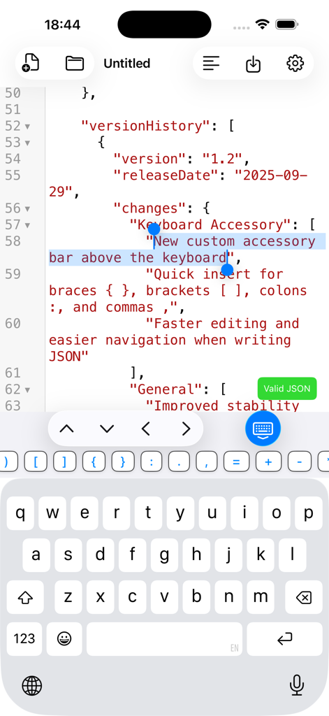 JSONCraft mobile editor showing valid JSON syntax and custom keyboard accessory bar for faster coding on iPhone