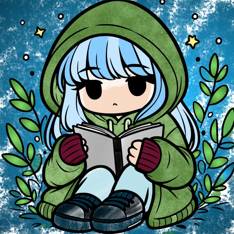 girl in oversized hoodie reading a book