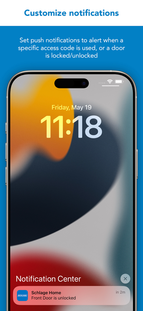 iPhone lock screen showing a Schlage Home push notification stating the front door is unlocked
