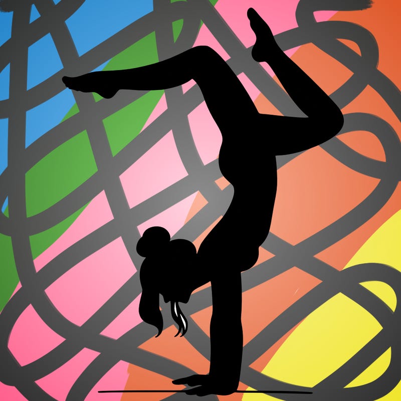 a woman doing a handstand