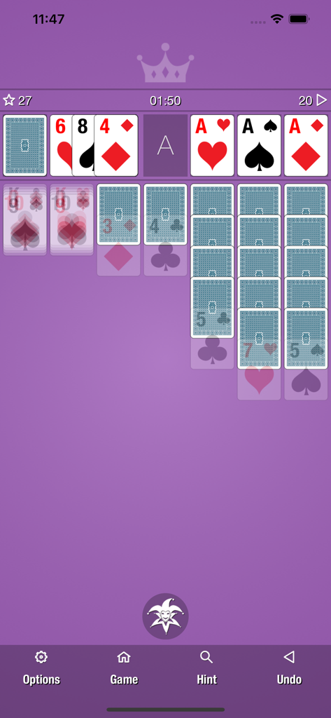 Simple Classic Solitaire - Classic Klondike solitaire card game in progress on a purple background