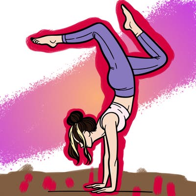 a woman doing a handstand