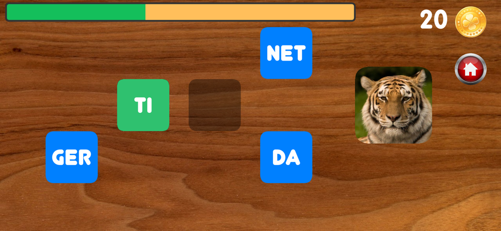 Writing with syllables - Un niño aprendiendo a escribir la palabra tigre usando bloques de sílabas en una aplicación educativa de fonética.