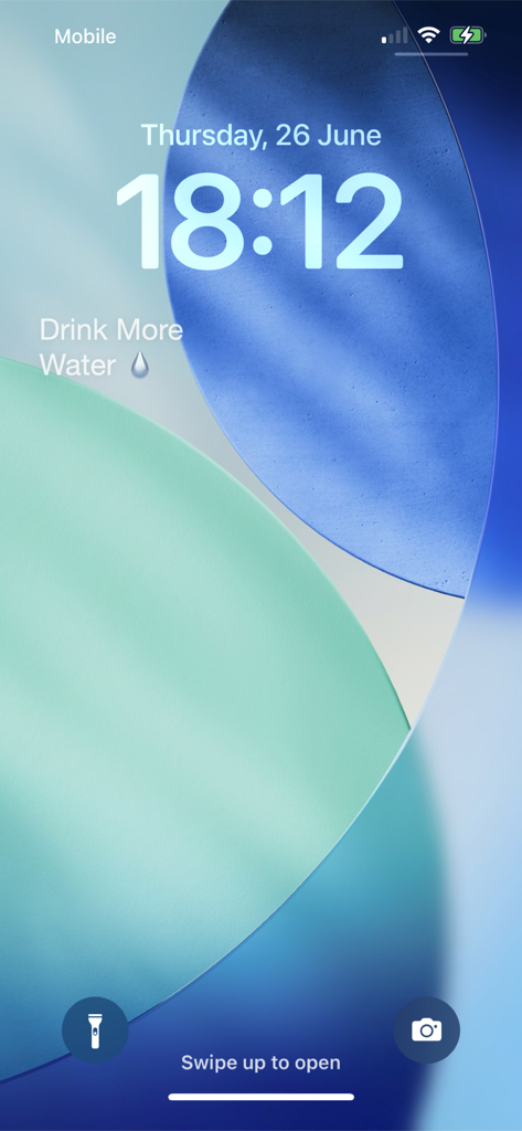 Any Text Widget - Pantalla de bloqueo del iPhone mostrando un widget de texto personalizado para Beber Más Agua.