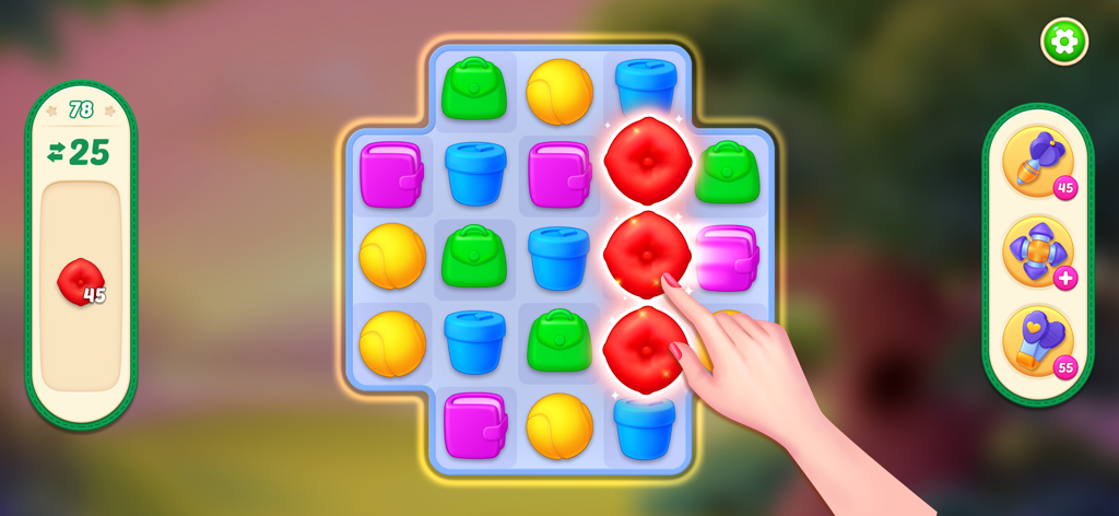 Makeover Master - Home Design - Gameplay screen of Makeover Master showing a hand matching red cushion icons in a colorful puzzle grid