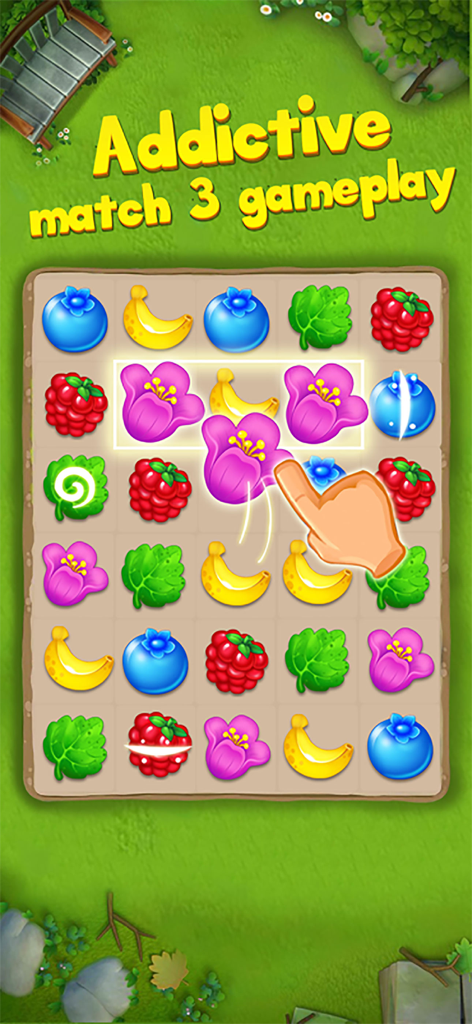 Screenshot del gameplay di Fruit Crush Match 3 che mostra una mano che abbina fiori rosa su una griglia di frutta colorata.