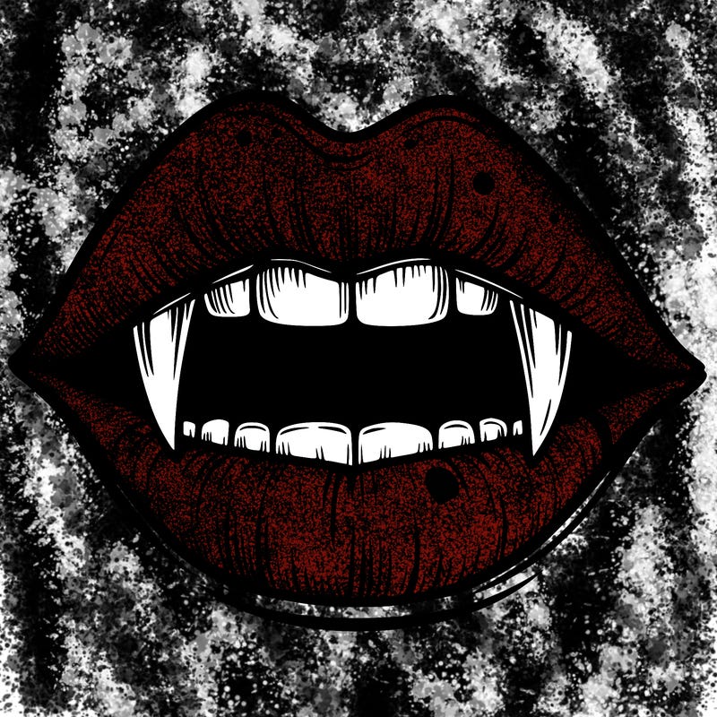 lips with vampire teeth