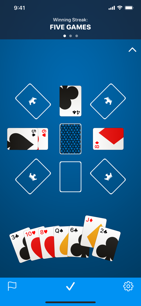 Gameplay screen of King's Corner showing a card table with crown slots and a player hand