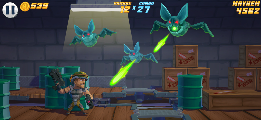 Major Mayhem 2: Action Hero - Major Mayhem character battling robotic bats in a warehouse environment with barrels and crates.