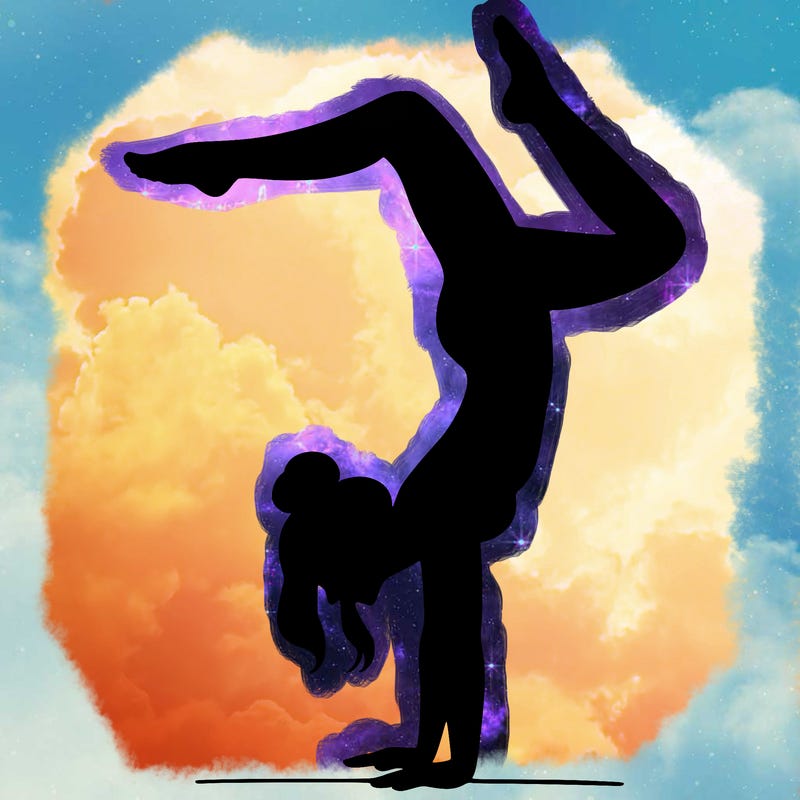 a woman doing a handstand